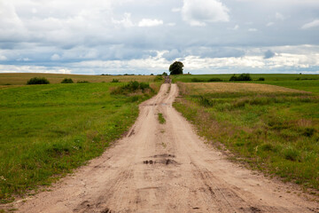 an empty old paved road
