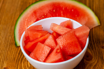red ripe watermelon divided into pieces