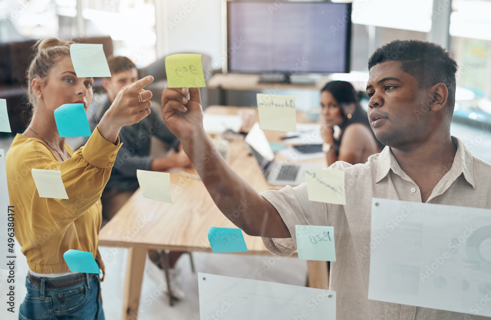 Poster planning is important to help guide your decisions. shot of a group of businesspeople brainstorming 