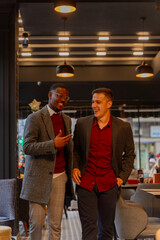 Talking and smiling while looking for a place to sit