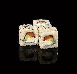 rolls on a black background with reflection