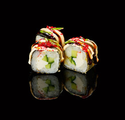 rolls on a black background with reflection