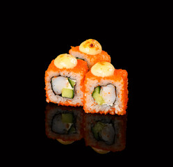 rolls on a black background with reflection