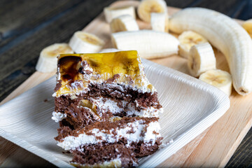a piece of banana cake and fresh sliced bananas