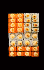 rolls on a black background with reflection