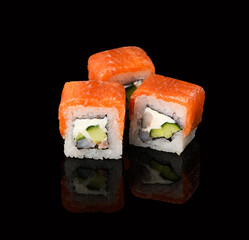 rolls on a black background with reflection