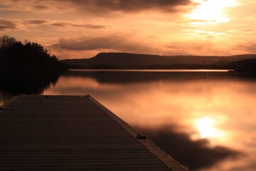 Obraz na płótnie Canvas pier with sunset background - Fornebu