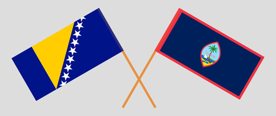 Crossed flags of Bosnia and Herzegovina and Guam. Official colors. Correct proportion