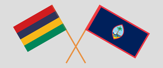 Crossed flags of Mauritius and Guam. Official colors. Correct proportion