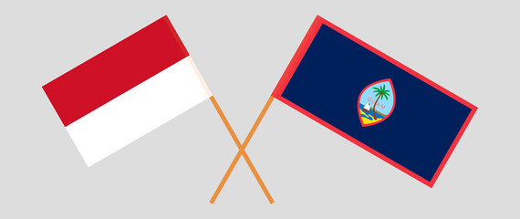 Crossed flags of Indonesia and Guam. Official colors. Correct proportion