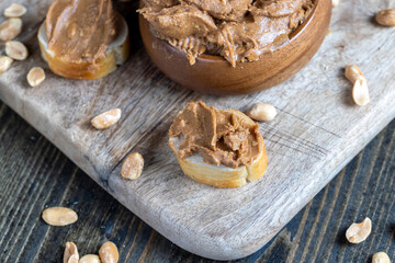 nut food on a cutting wooden board in the kitchen