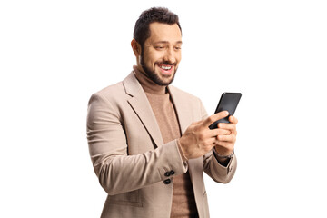 Happy young man using a smartphone and smiling