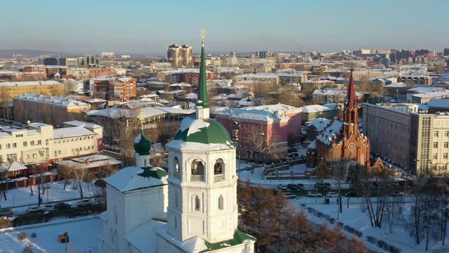 Aerial around view of the Spasskaya Church of our saviour, the oldest brick-and-stone edifice in east Siberia, Irkutsk, Russia, 4k