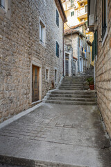 Fototapeta na wymiar Narrow street of old town in Herzeg Novi, Montenegro