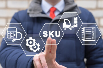 Concept of SKU Stock Keeping Unit. Businessman using virtual touchscreen presses SKU abbreviation.