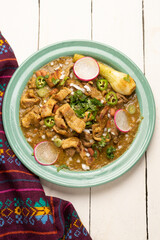 Meat in its juice is a stew with green sauce and steak. Mexican food