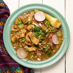 Meat in its juice is a stew with green sauce and steak. Mexican food