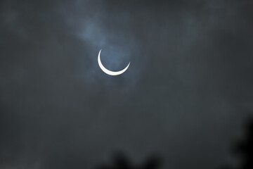 Obraz na płótnie Canvas This is a solar eclipse event that took on december26/2019 in the state of Tamil Nadu, India. it's look like a symbol of the islam crescent Moon