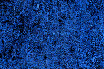 Fototapeta na wymiar The rough texture of the wall is blue-cyan. Concept of street photography. Graffiti element in design.