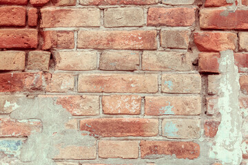 Rough texture of an old brick wall in 80-90s style. Bright brickwork in street style. Red and white brickwork.