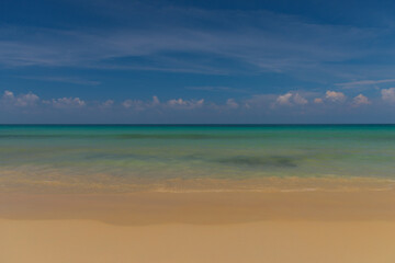Fototapeta na wymiar Tropical island with beautiful beach in the morning.