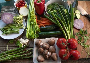 Top view of fresh vegetables on natural wood table