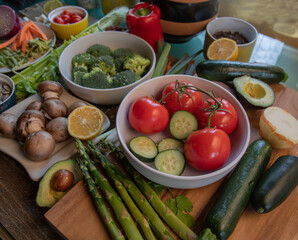 Top view of fresh vegetables on natural wood table