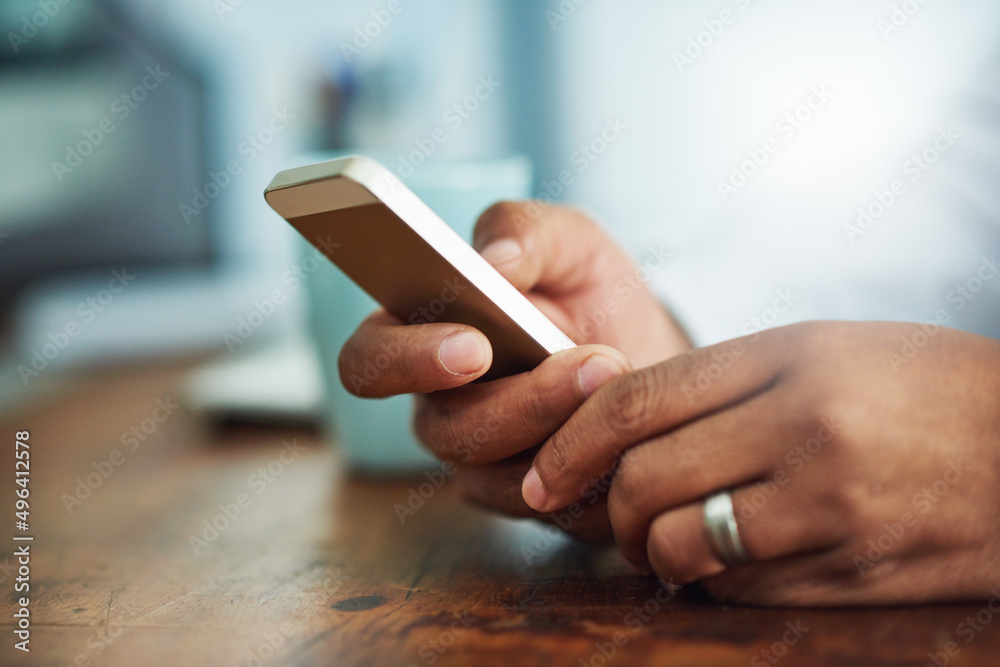 Poster always connected, always available. closeup shot of a businessman texting on a cellphone at work.