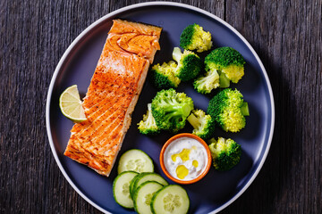 roast salmon fillet with boiled broccoli and sauce