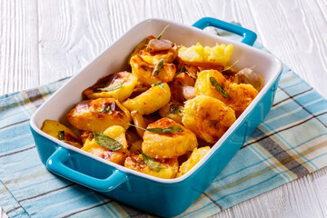 roasted squashed potatoes with garlic and sage