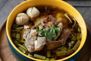 Braised pork kaolao with morning glory and sprouts, local Thai food