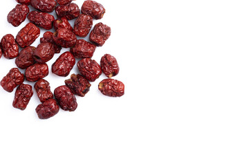 Dried Chinese jujube piled on a white background. Isolated image.