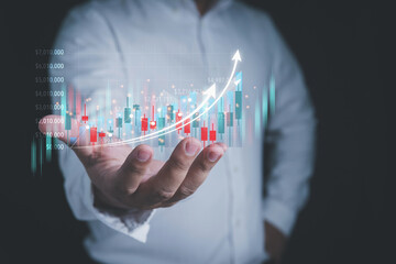 Stock market investment, Business growth, and stock trading concept. Businessman, The trader is showing a chart of growing virtual hologram stock planning and strategy with copy space.