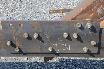 Assembly of steel tower with bolt and nut on site