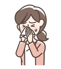 鼻をかんでいる女性