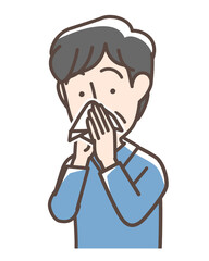 鼻をかんでいる男性