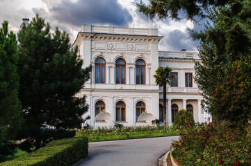 Fototapeta na wymiar Exterior of the Livadia Palace in Yalta in Crimea with a beautiful garden in summer