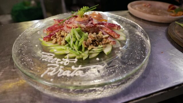 Seafood. Closeup view of a King Crab dish in the restaurant kitchen, ready for service.  