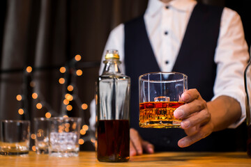 Bartender Serve Whiskey, on wood bar, 