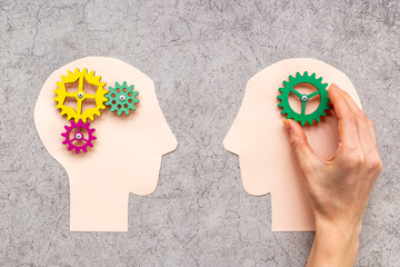 Teamwork concept, brain storm. Communication between two paper human heads