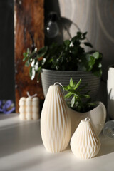 Beautiful curly candles in the interior