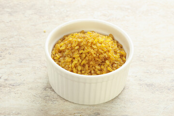 Raw bulgur in the bowl