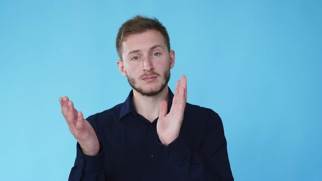 Skeptical man. Unimpressed expression. Negative attitude. Boomerang animation. Discontent guy clapping hands in sarcastic emotion isolated on blue background GIF loop motion.
