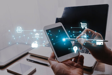 Man holding credit card and using smartphone at home office, businessman shopping online, e-commerce, internet banking, spending money, working from home concept, Asian man.