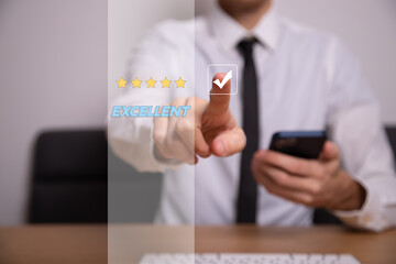 Businessman pressing smiley face emoticon on virtual touch screen