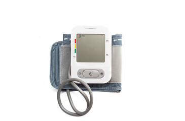 A device for measuring pressure, tonometer on a white medical background.