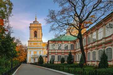 Fototapeta na wymiar View of the bell tower of the Trinity Cathedral in the current male Orthodox monastery of the Holy Trinity Alexander Nevsky Lavra on an autumn morning, St. Petersburg, Russia