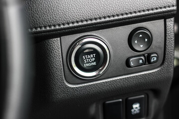 Close up engine car start button. Start stop engine modern new car button,Makes it easy to turn...