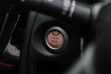 Close up engine car start button. Start stop engine modern new car button,Makes it easy to turn your auto mobile on and off. a key fob unique ,selective focus