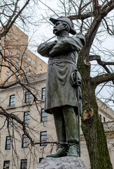 Black Soldier with sword statue at Riverside Park, Harlem, New York City, view from low angle,...